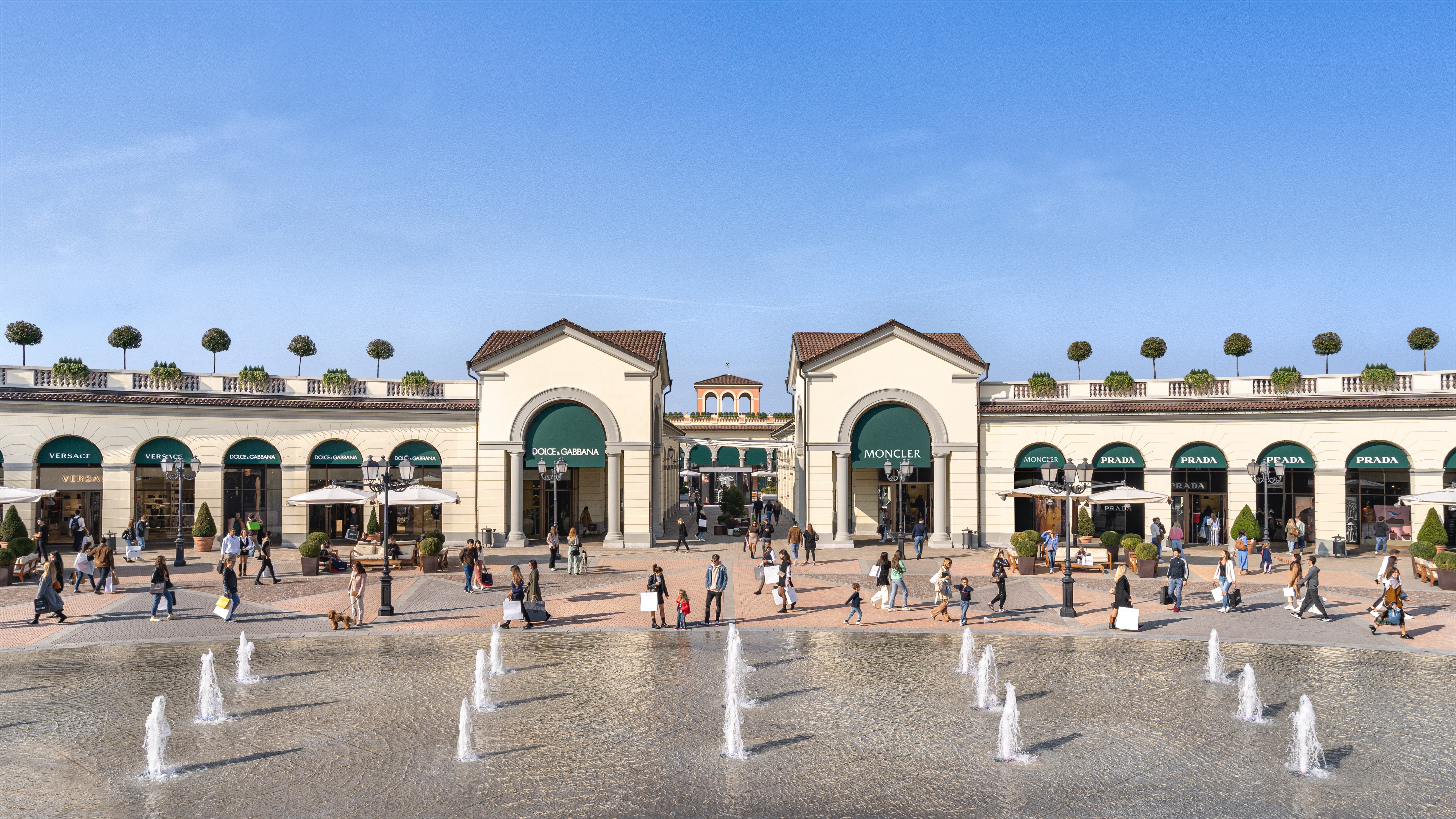 Luxury storefronts and open-air plaza at Serravalle Designer Outlet